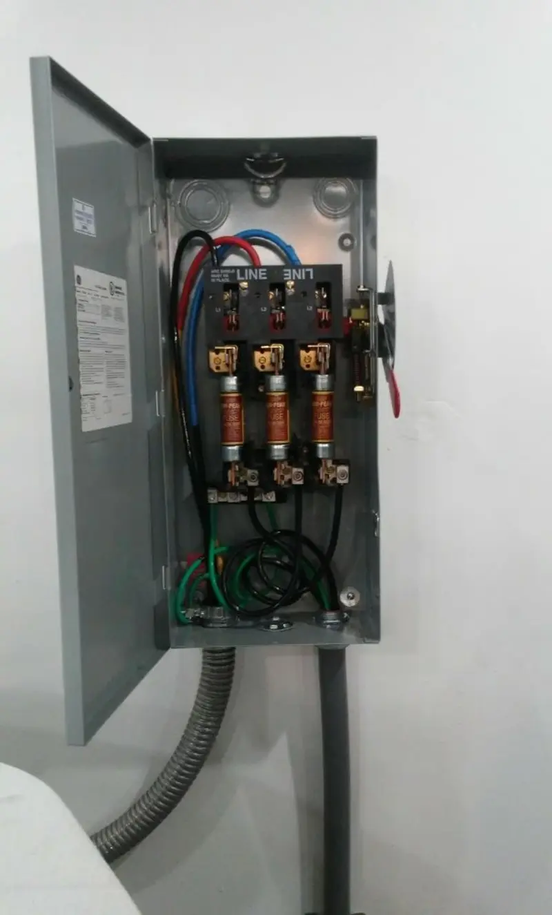 Three-phase disconnect switch installed for Smoke Detector Installation in Brownfields